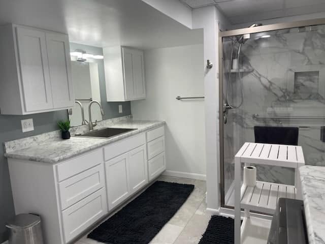 A finished basement conversion with new flooring and lighting