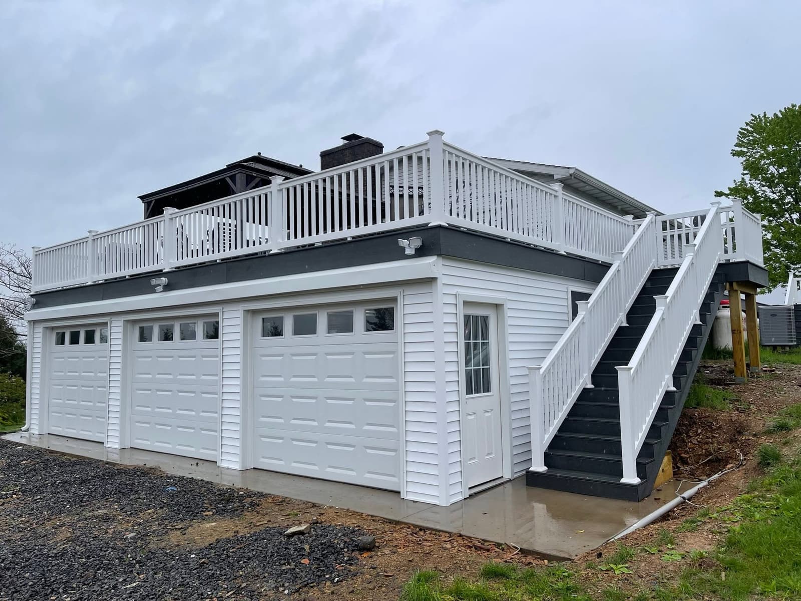A newly built backyard deck with railings