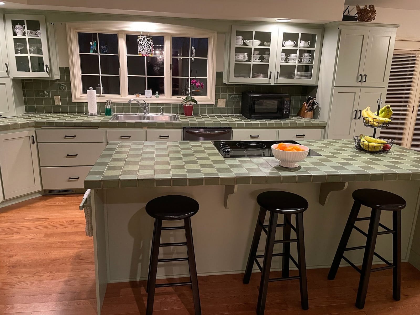 A finished kitchen remodel with new cabinets and counters